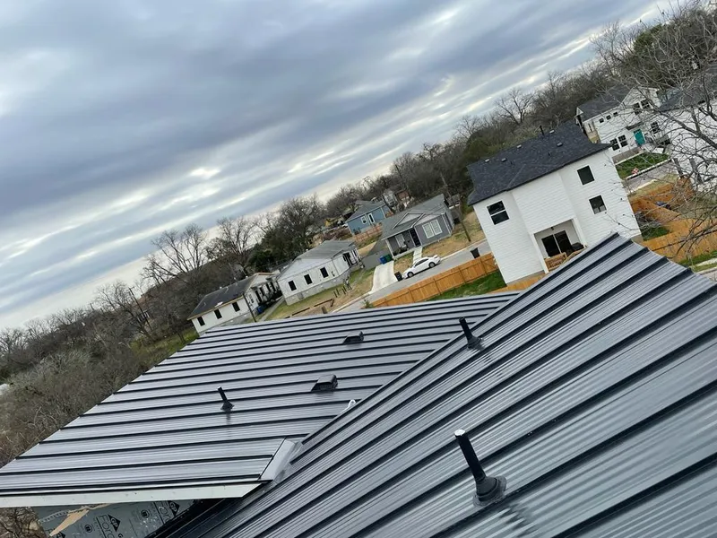 Standing seam metal roof panels with vents for Skylight Repair in Anamosa